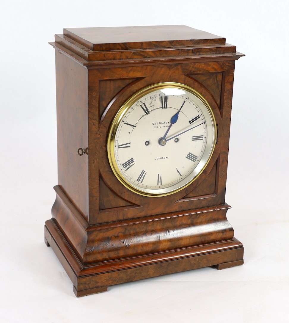 George Blackie, 392 Strand, London. A Victorian figured walnut mantel clock, 35cm wide, 24cm deep, 46cm high